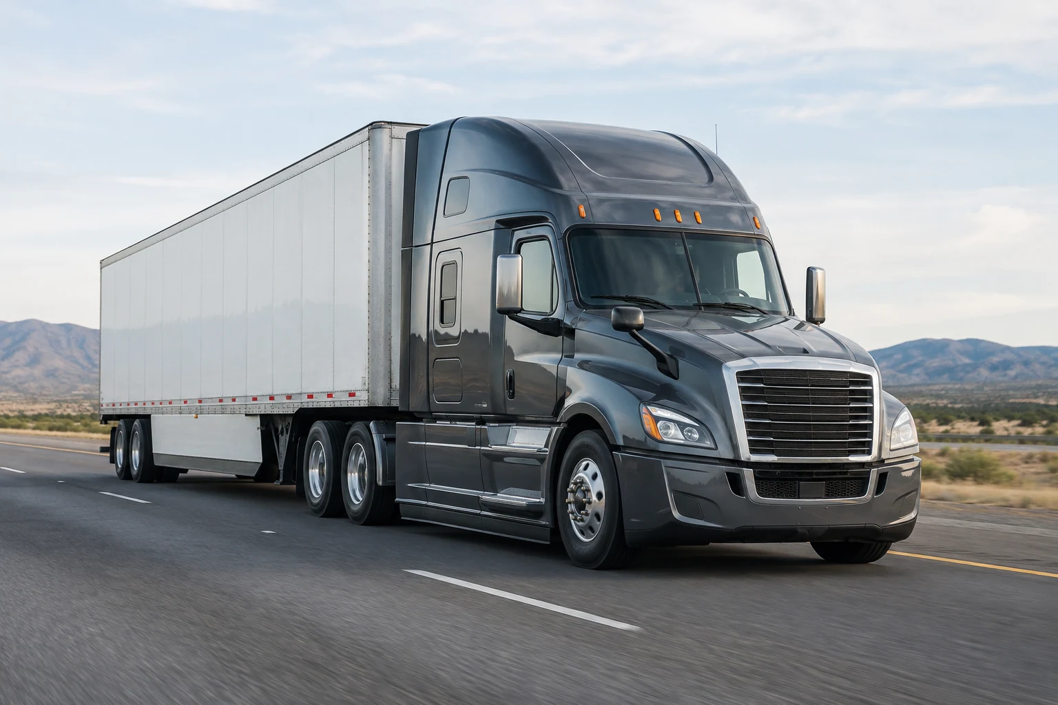 American tractor-trailer traveling on an open interstate